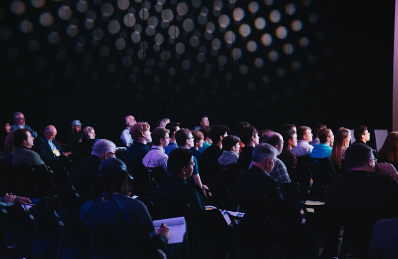 Audience seated for a panel discussion