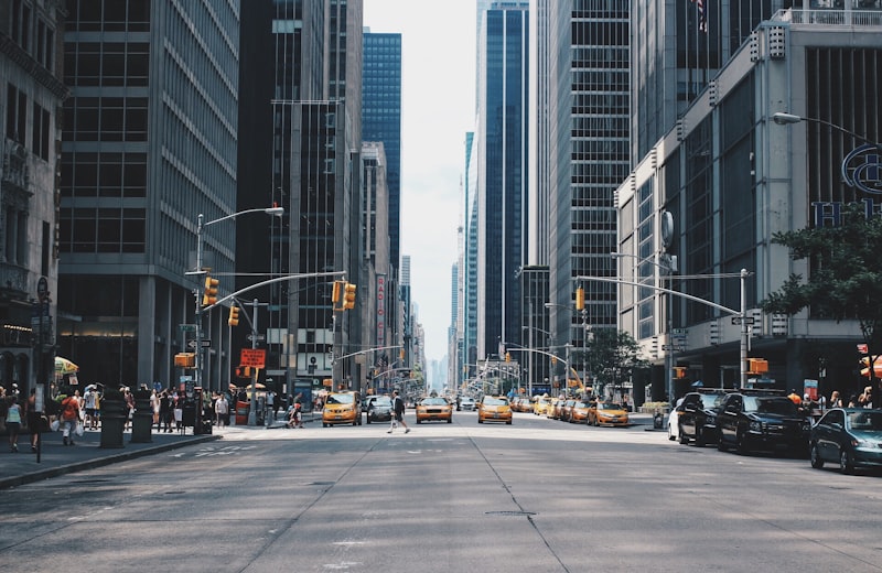 Urban street with traffic and high-rise buildings